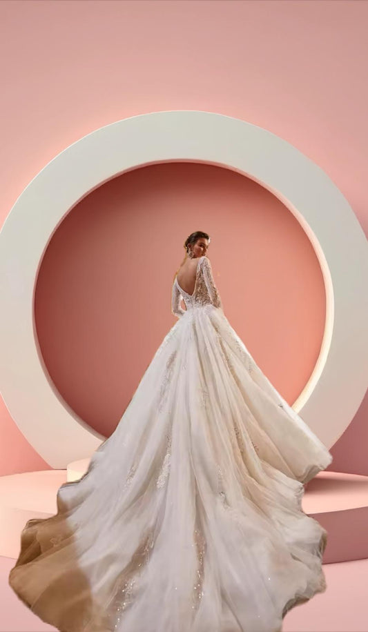 Elegant long train beaded bridal gown