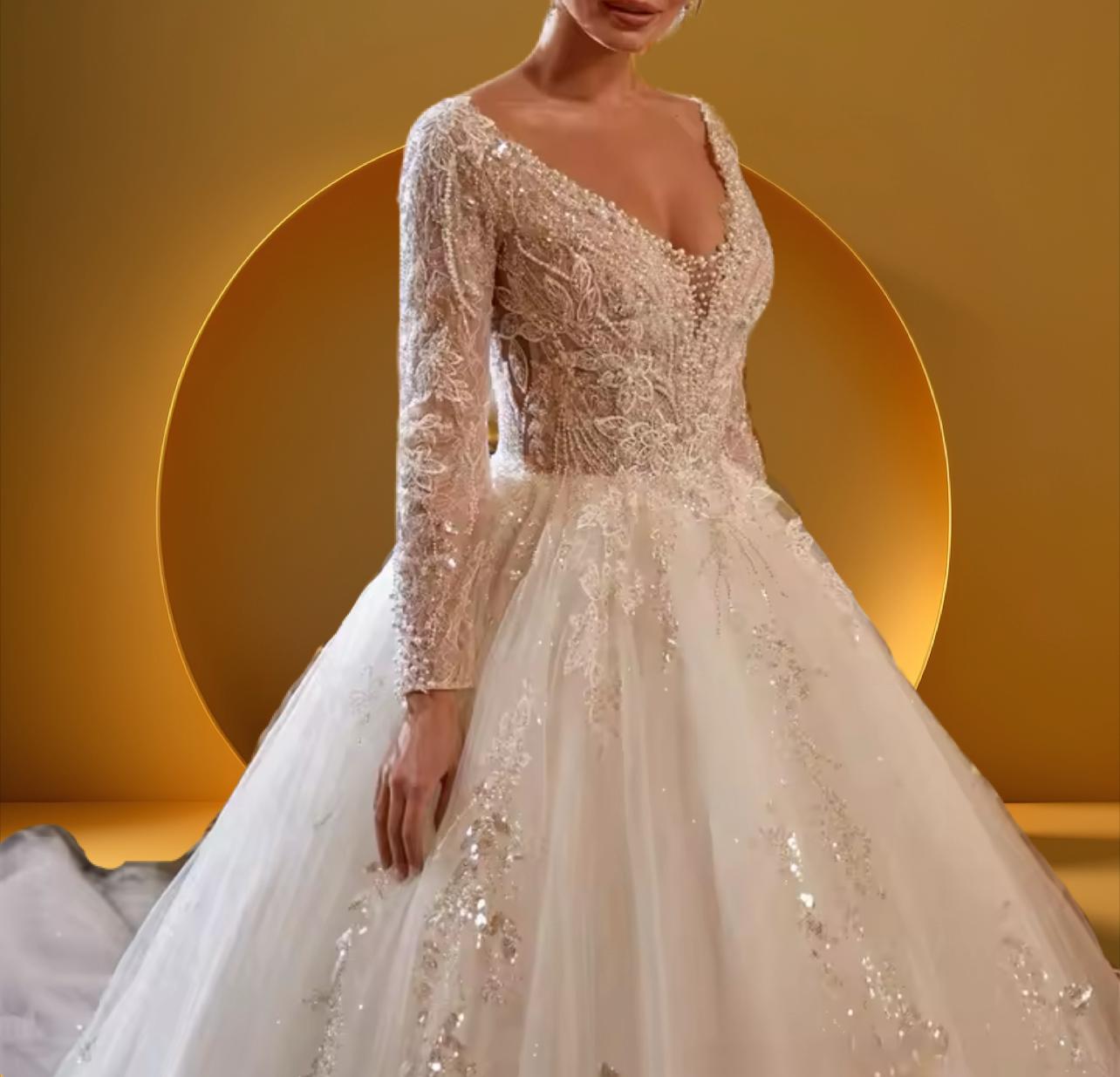 Elegant long train beaded bridal gown