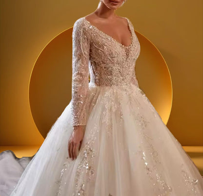 Elegant long train beaded bridal gown