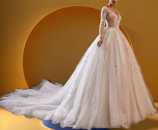 Elegant long train beaded bridal gown